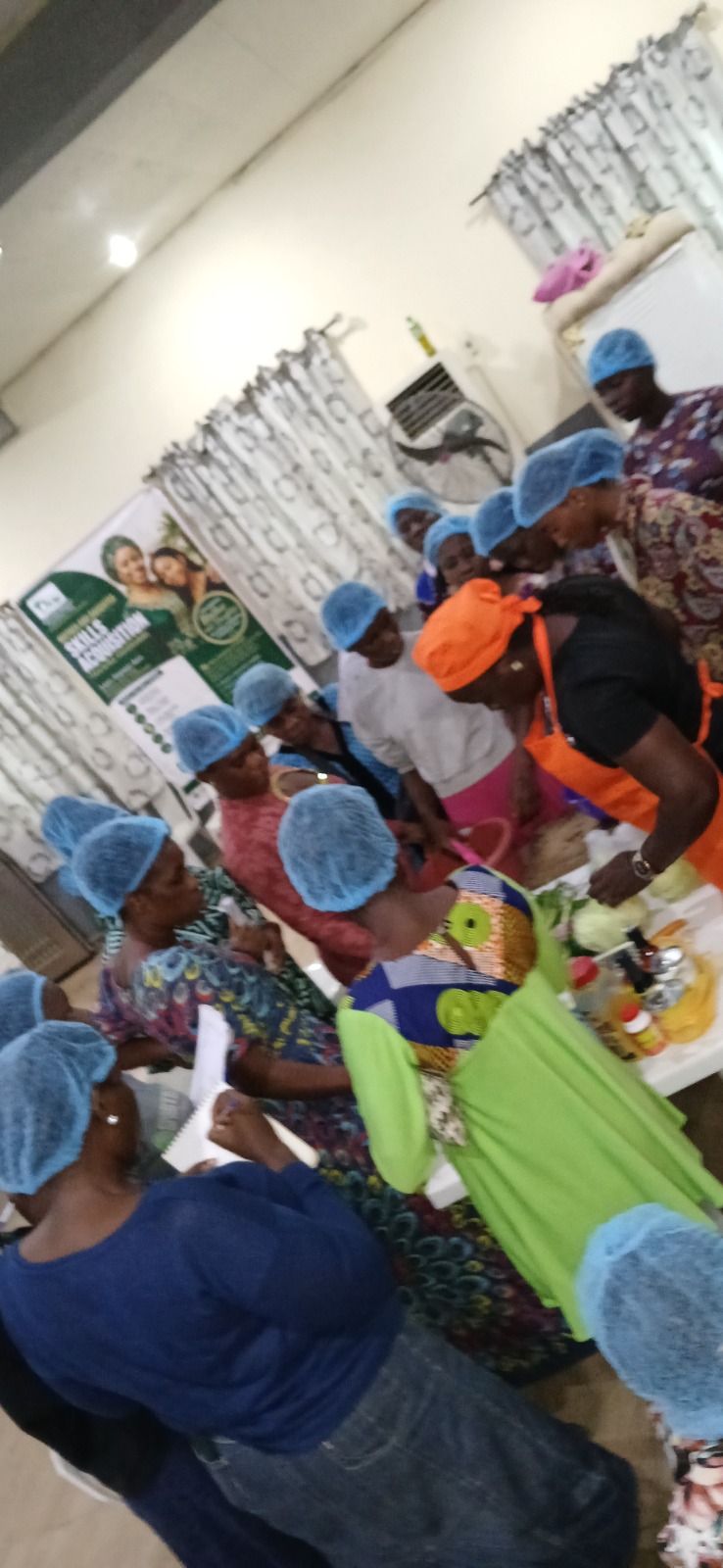 Mothers and daughters working together around a training table